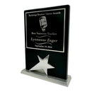 Close-up of black plaque with engraved text and silver star