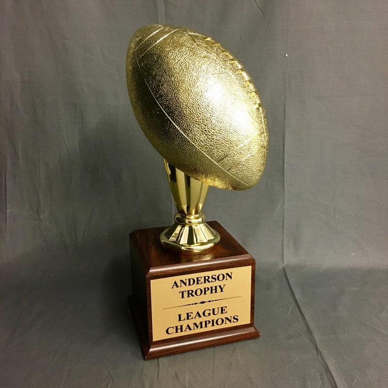 Gold Champions Football Trophy on Woodgrain Finish Base - AndersonTrophy.com